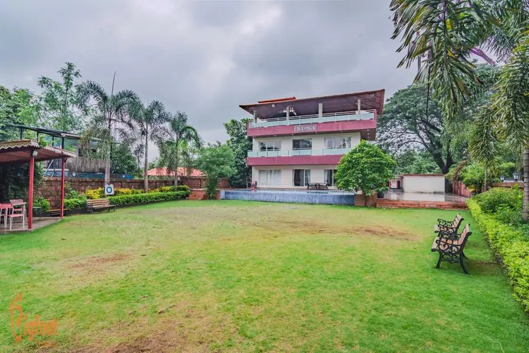 The lawn and garden at Hideaway Villa, Karjat