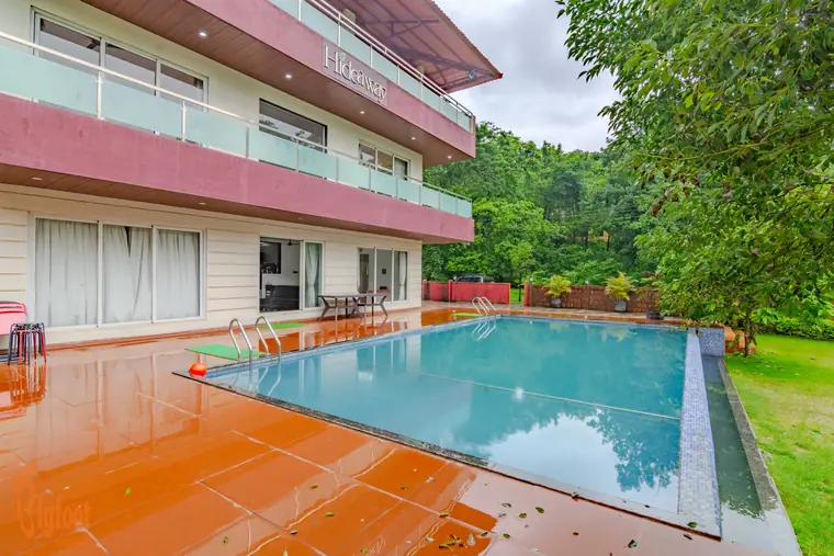 The pool deck at Hideaway Villa, Karjat