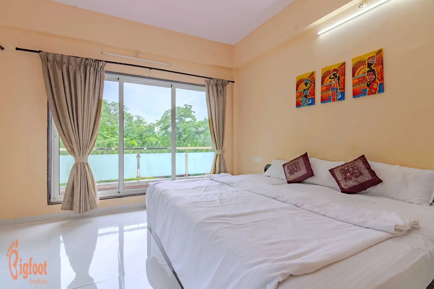 Queen bedroom at Hideaway Villa in Karjat with garden views